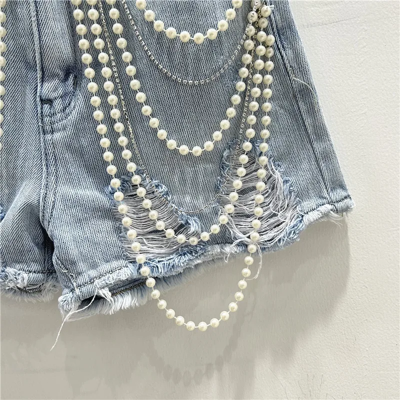 شورت جينز ممزق بفتحات ممزقة من - مراجعة Distressed Jean Rip وسعره